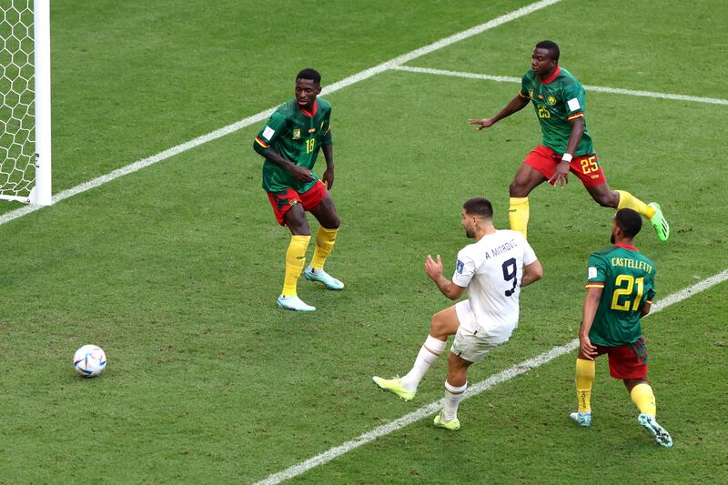 Aleksandar Mitrovic scores Serbia's third goal against Cameroon. Getty