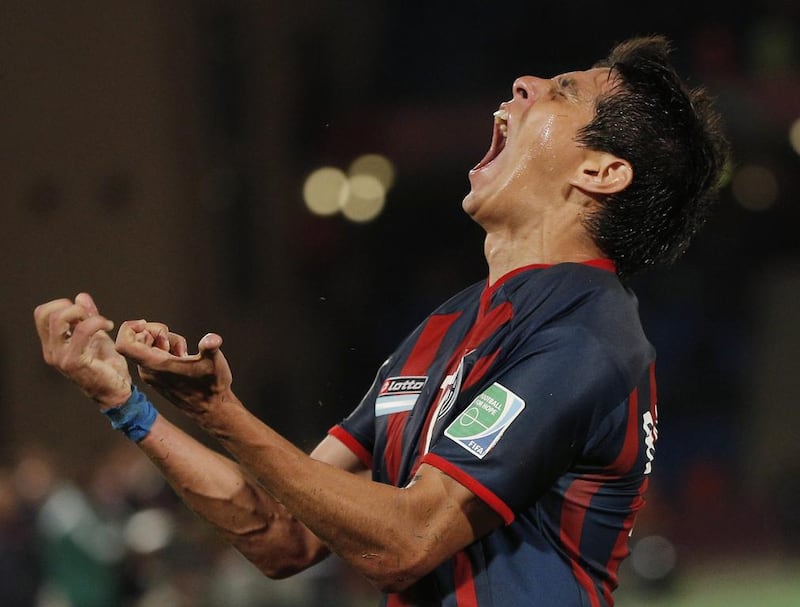 San Lorenzo's Pablo Barrientos celebrates after scoring during the semi-final match between Auckland City FC and San Lorenzo at the Club World Cup soccer tournament in Marrakech, Morocco, Wednesday, Dec. 17, 2014. Christophe Ena / AP Sports