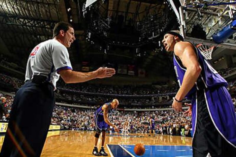 Tim Donaghy, left, during his time as an NBA referee.