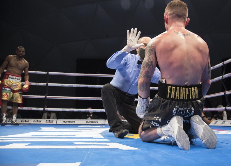 Dubai, United Arab Emirates - Carl Frampton of Northern Ireland knock off balance by Jamel Herrinng of United States  against  Jamel Herring of USA at the Rotunda, Ceasar's Palace, Bluewaters Island, Dubai.  Leslie Pable for The National