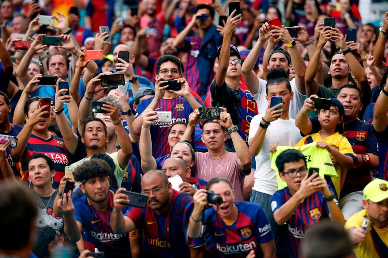 Barcelona fans were in good spirits in Miami. AFP