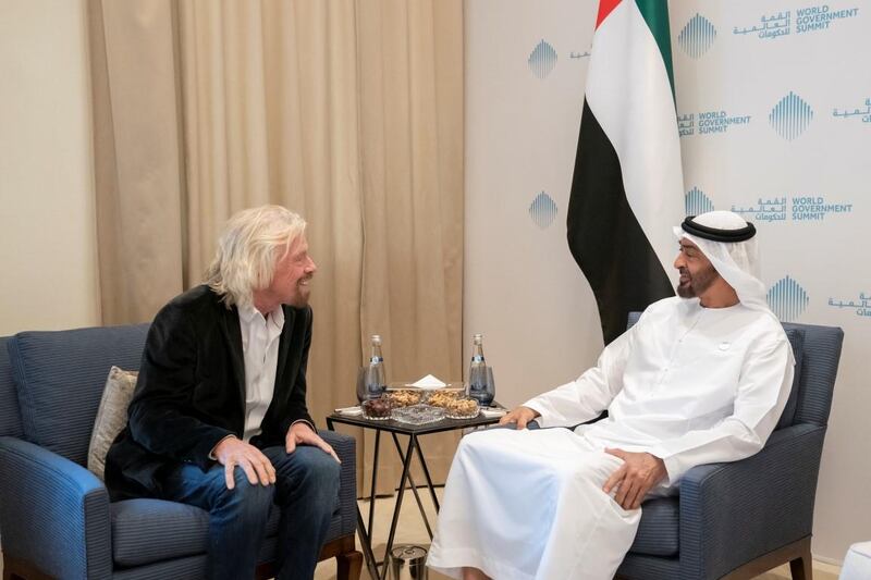 JUMEIRAH, DUBAI, UNITED ARAB EMIRATES - February 12, 2019: HH Sheikh Mohamed bin Zayed Al Nahyan Crown Prince of Abu Dhabi Deputy Supreme Commander of the UAE Armed Forces (R), meets with Richard Branson, founder of Virgin Group and Chairman of the Board of Virgin Galactic (L), during the 2019 World Government Summit.

( Mohamed Al Hammadi / Ministry of Presidential Affairs )
---
