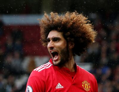 Soccer Football - Premier League - Manchester United vs Crystal Palace - Old Trafford, Manchester, Britain - September 30, 2017   Manchester United's Marouane Fellaini celebrates scoring their third goal   REUTERS/Andrew Yates  EDITORIAL USE ONLY. No use with unauthorized audio, video, data, fixture lists, club/league logos or "live" services. Online in-match use limited to 75 images, no video emulation. No use in betting, games or single club/league/player publications. Please contact your account representative for further details.