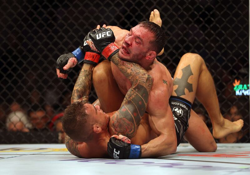 Dustin Poirier battles Michael Chandler during their lightweight fight at UFC 281. Getty