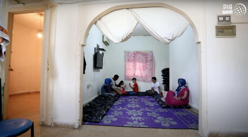 Sama and her family in their home in Beirut. Their flat was damaged by the port blast in August. Wam