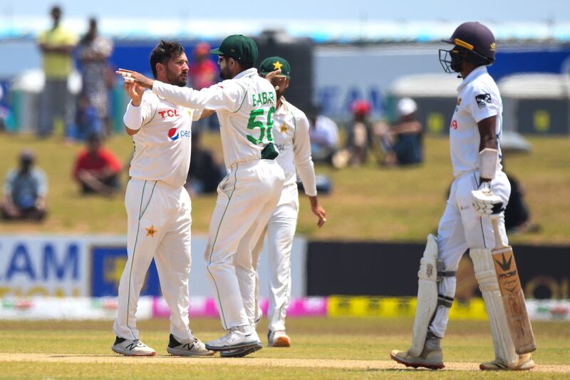 Pakistan’s Yasir Shah after taking the wicket of Sri Lanka's Oshada Fernando. AFP