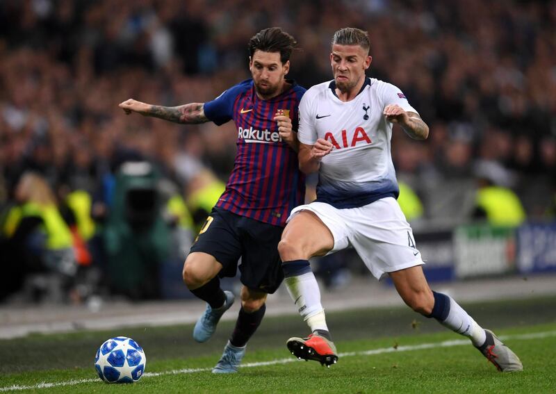 Barcelona's Lionel Messi battles for possession with Tottenham Hotspur's Toby Alderweireld. Getty Images