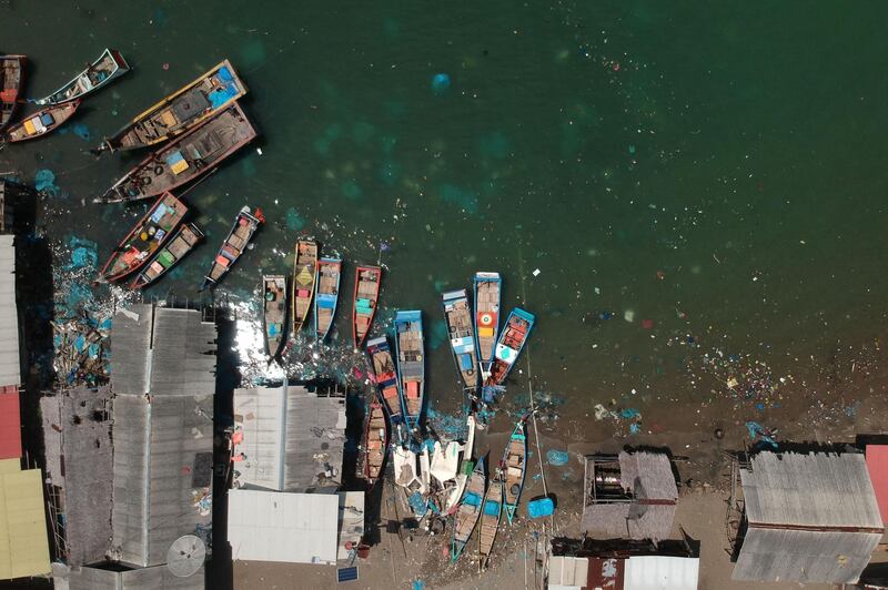 Plastic waste fills the seabad of a coastal fishing village in Lhokseumawe, Aceh province, Indonesia.  AFP