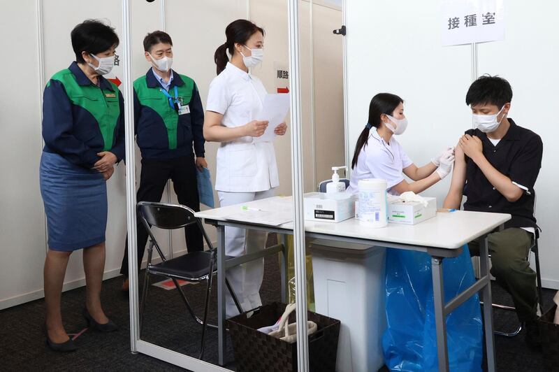 Tokyo Govenor Yuriko Koike, left, inspects a vaccination centre at the Tokyo Metropolitan Government office. AP Photo