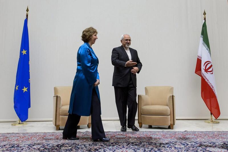 The EU’s foreign policy chief Catherine Ashton (left), with Iranian foreign minister Mohammad Javad Zarif before the start of the Geneva talks. Fabrice Coffrini / EPA

