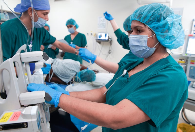 Doctors at Corniche Hospital in Abu Dhabi perform endometriosis laparoscopic surgery. All photos: Victor Besa / The National