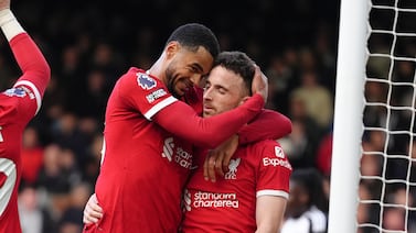 Liverpool's Diogo Jota celebrates with team-mates afterscoring their side's third goal of the game during the Premier League match at Craven Cottage, London. Picture date: Sunday April 21, 2024. PA Photo. See PA story SOCCER Fulham. Photo credit should read: Zac Goodwin/PA Wire.

RESTRICTIONS: EDITORIAL USE ONLY No use with unauthorised audio, video, data, fixture lists, club/league logos or "live" services. Online in-match use limited to 120 images, no video emulation. No use in betting, games or single club/league/player publications.