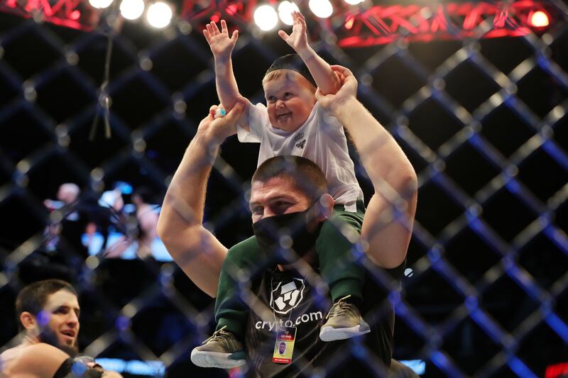 Coach Khabib Nurmagomedov celebrates Islam Makhachev's win over Dan Hooker.