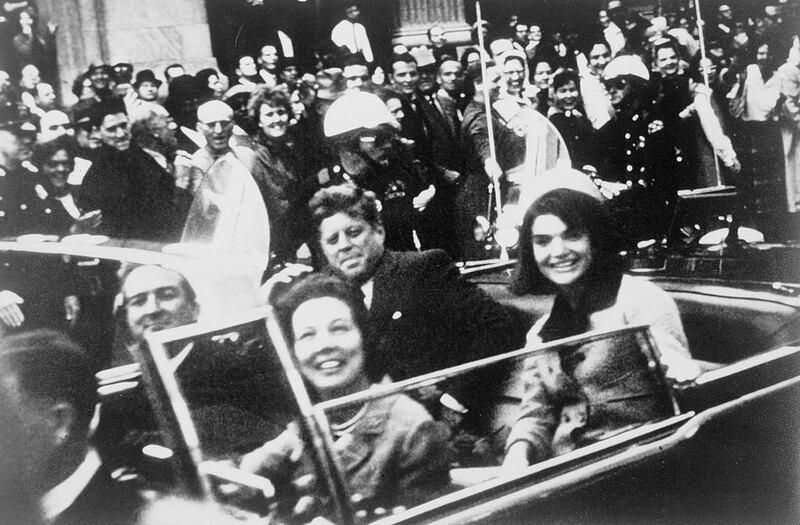 Former US  President John F. Kennedy and First Lady Jacqueline Kennedy ride in the presidential motorcade with Texas governor John Connally and his wife moments before the president was shot in Dallas, Texas on November 22, 1963. Victor Hugo King / Congress Library via Reuters

