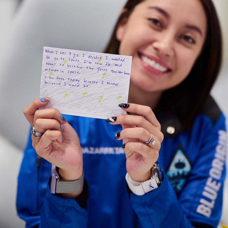 Katya Echazarreta holds up a letter she wrote to herself before her flight on Blue Origin. Photo: Katya Echazarreta / X