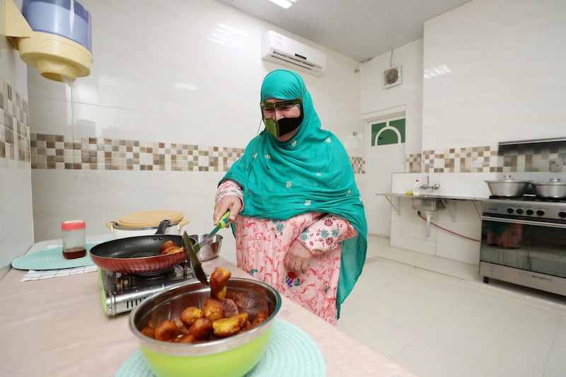Ras al Khaimah, United Arab Emirates - May 26, 2019: Fatima Al Mulla, 65. Emirati Iftar at Hajar Al Mansouri house as part of the Emirati values iftar project led by the Federal Youth Foundation aims to educate people on traditional UAE values. the project will see Emiratis urged to host expatriates for iftar during Ramadan. Sunday the 26th of May 2019. Ras al Khaimah. Chris Whiteoak / The National