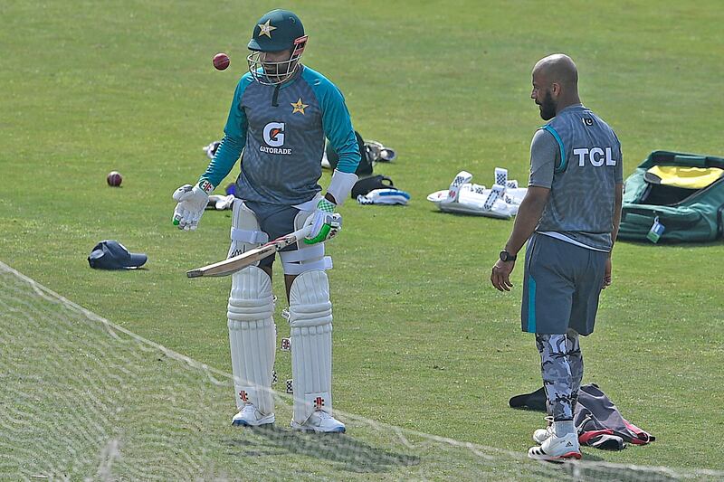 Pakistan's captain Babar Azam, left, prepares to bat next to teammate Sajid Khan. AFP