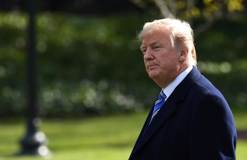 FILE - In this March 23, 2018, file photo, President Donald Trump walks across the South Lawn of the White House in Washington, as he heads to Marine One for a short trip to Andrews Air Force Base. Looking to get ahead in Trump's Washington? Borrow his media playbook. With suggestive statements, cryptic tweets, provocative lawsuits and must-see television interviews, Trumpâ€™s political foils are using some of his own tactics to grab - and keep - the spotlight. (AP Photo/Susan Walsh, File)