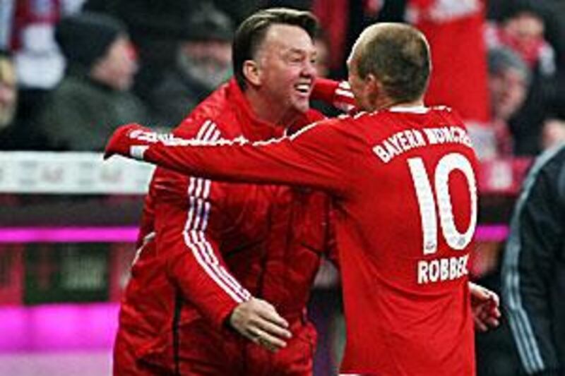 Van Gaal hugs Arjen Robben after the Dutch winger's goal against Mainz.