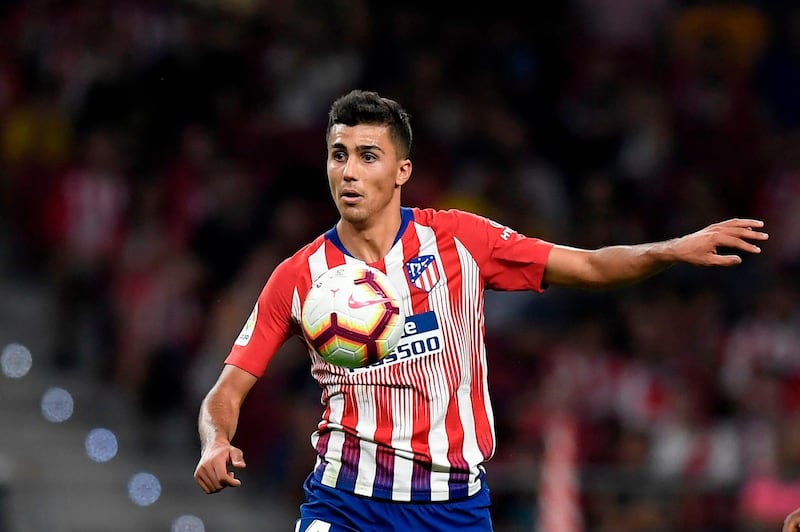 (FILES) In this file photo taken on August 25, 2018 Atletico Madrid's Spanish midfielder Rodri controls the ball during the Spanish league football match between Club Atletico de Madrid and Rayo Vallecano at the Wanda Metropolitano stadium in Madrid. Premier League champions Manchester City on July 4, 2019 announced the signing of Spain midfielder Rodri on a five-year deal from Atletico Madrid. Rodri, 23, officially became a City player a day after the La Liga club revealed the 70-million-euro (£63 million) release clause in his contract had been triggered.
 / AFP / GABRIEL BOUYS
