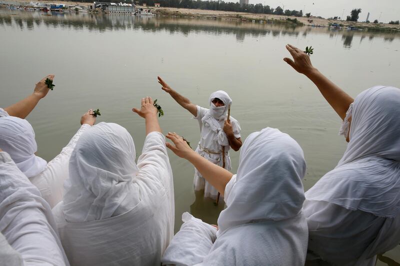 Mandaeans at prayer during the Benja religious festival in Baghdad, Iraq. Reuters