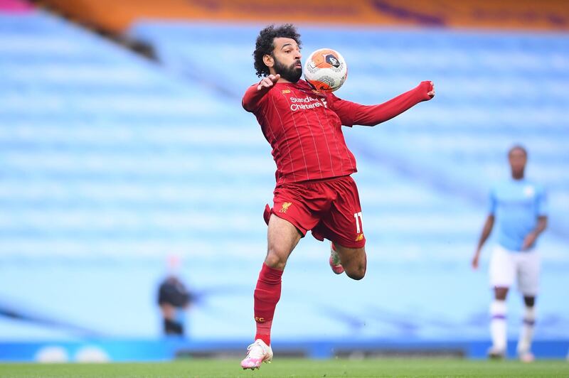 Mohamed Salah - 7: Forced an early save out of Ederson and hit the post in the first half before City ran riot. Looked the most likely Liverpool player to score. AFP