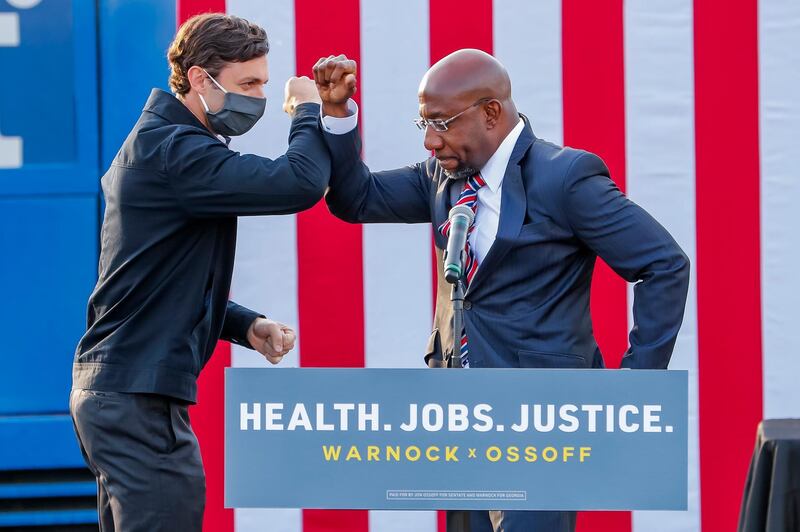 Democratic Georgia US Senate candidates Jon Ossoff and Reverend Raphael Warnock participate in a dual campaign event during the final week of early voting in their US Senate runoff election in Stonecrest, Georgia, USA. EPA