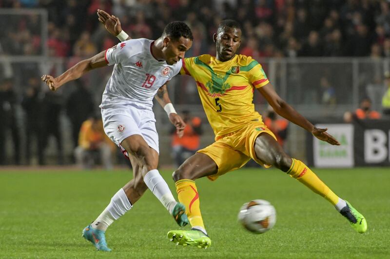 Tunisia defender Ayman Ben Mohamed under pressure from Mali's Boubakar 'Kiki' Kouyate. AFP