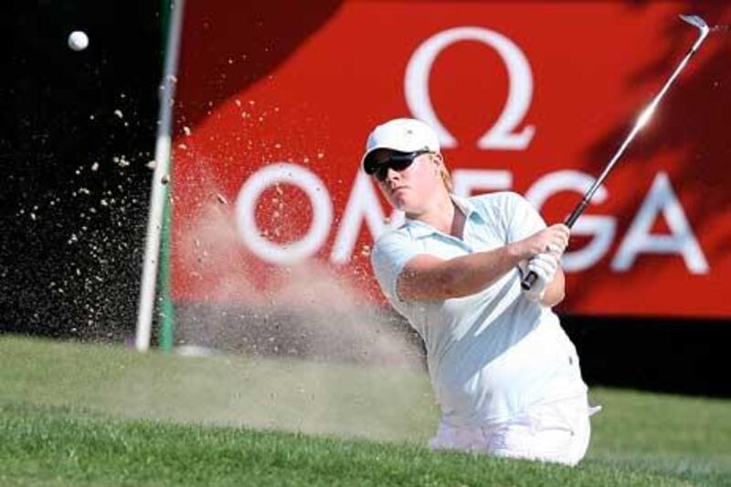 Lydia Hall playing a shot from a bunker at the Omega Dubai Ladies Masters at Emirates Golf Club in Dubai.