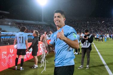 Uruguay's Luis Suarez celebrates after defeating Peru during the South American qualification football match for the FIFA World Cup Qatar 2022 at the Centenario Stadium in Montevideo on March 24, 2022.  (Photo by Matilde Campodonico  /  POOL  /  AFP)