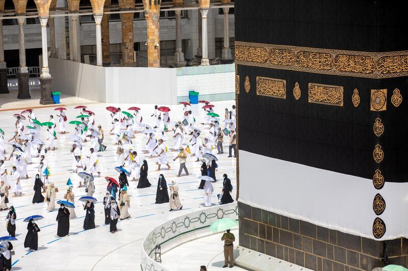 Pilgrims circle around the Kaaba at the Masjidil Haram, Islam's holiest site, during the Tawaf Al Qudum (Tawaf of Arrival) on the first day of Hajj 2020. EPA
