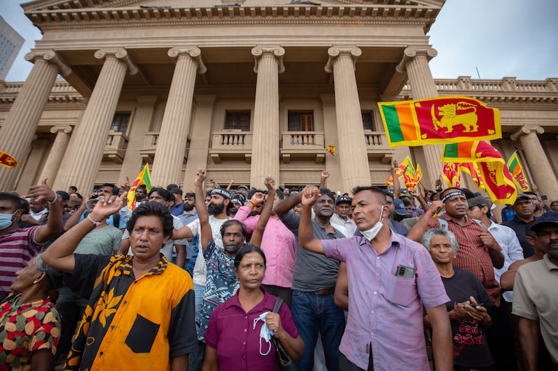 Sri Lankans protest after Mr Wickremesinghe defeated Dullas Alahapperuma, a member of the breakaway faction of the ruling Sri Lanka Podujana Peramuna party, by 134 votes to 82 in a parliamentary vote to pick the next president. Getty