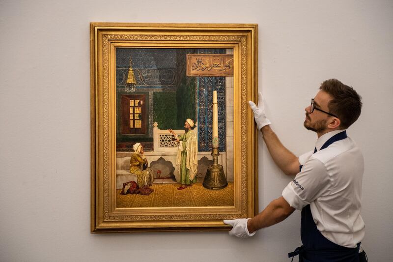 LONDON, ENGLAND - OCTOBER 11: Koranic Instruction, by Osman Hamdy Bey, is seen during a preview of 155 works from the greatest collection of Orientalist paintings ever assembled at Sotheby's on October 11, 2019 in London, England. 40 works from 'The Najd Collection' will go on sale October 22, 2019 in London. (Photo by Chris J Ratcliffe/Getty Images for Sotheby's)