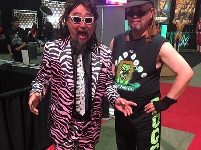 Masa Akao and Kensuke Yokoyama cosplayed at Wrestlemania Axxess dressed up like WWE stars Jimmy Hart and “Road Dogg” Jesse James in 2019. Evelyn Lau / The National