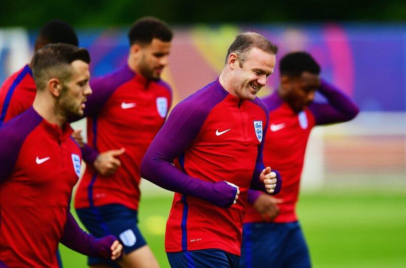 England captain Wayne Rooney, centre, takes part in a training session ahead of Euro 2016. Dan Mullan / Getty Images