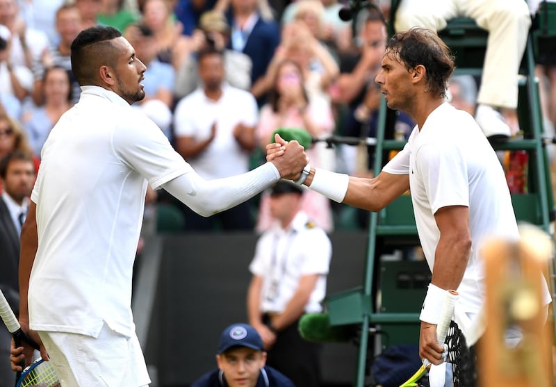 LONDON, ENGLAND - JULY 04: Rafael Nadal of Spain shakes hands at the net with Nick Kyrgios of Australia after their Men's Singles second round match during Day four of The Championships - Wimbledon 2019 at All England Lawn Tennis and Croquet Club on July 04, 2019 in London, England. (Photo by Mike Hewitt/Getty Images)