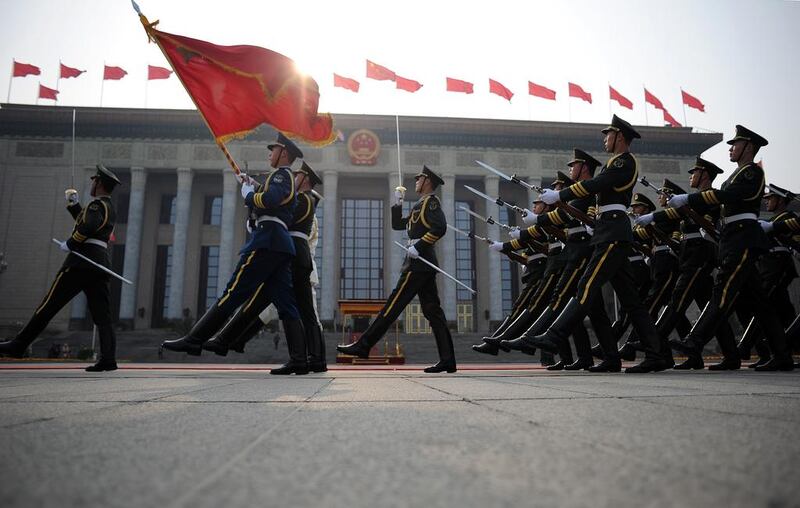 Chinese honour guards prepare for the arrival of Queen Margrethe II of Denmark and Chinese President Xi Jinping during a welcome ceremony at the Great Hall of the People in Beijing. Queen Margrethe II is on a visit to China from April 24 to 28. Wang Zhao / AP Photo