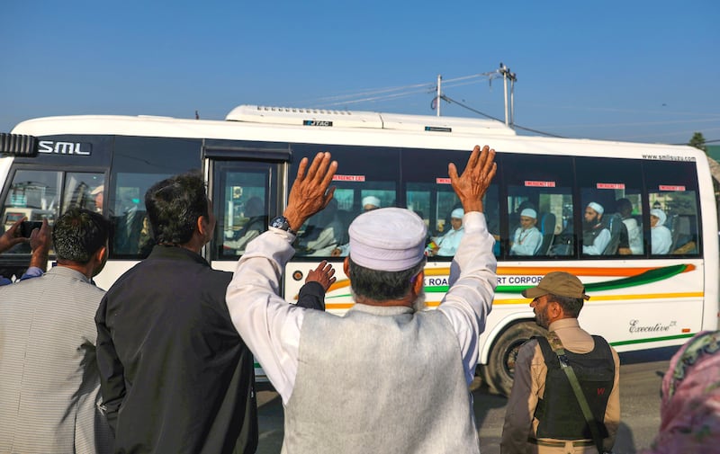 Kashmiri Muslims wave their hand towards Hajj pilgrims as they leave for the annual Hajj pilgrimage to the holy city of Mecca, in Srinagar, the summer capital of Indian Kashmir. The first batch of Hajj pilgrims of 2022 Hajj are leaving for Saudi Arabia to perform Hajj pilgrimage.  It is after 2 years that the annual Hajj pilgrimage is taking place.  The Hajj pilgrimage remained suspended in 2020 and 2021 due to the outbreak of Covid-19 pandemic. EPA