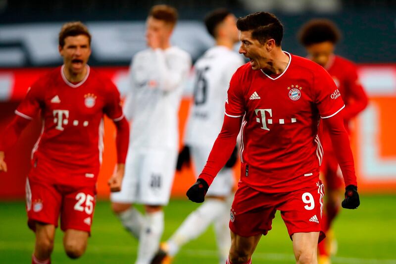 Bayern Munich's Polish forward Robert Lewandowski celebrates scoring the opening goal. AFP