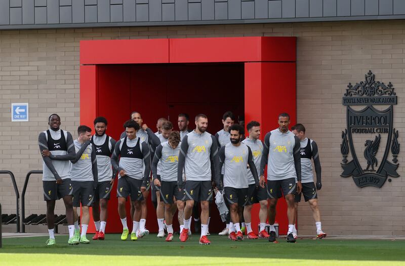 Liverpool players arrive for training. Reuters