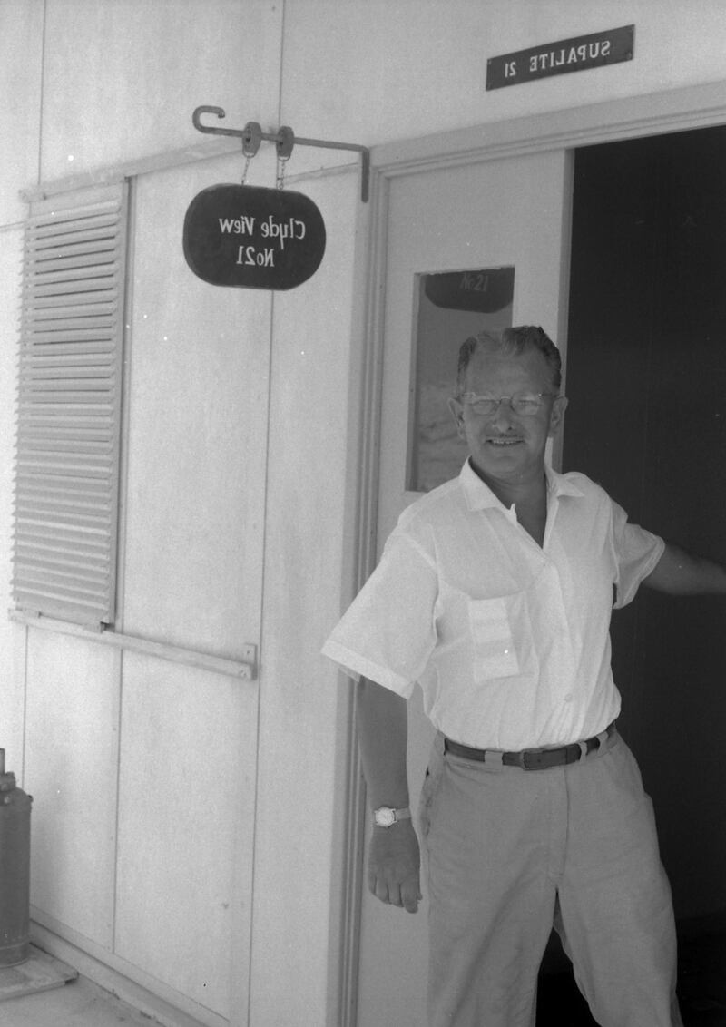 An engineer on Das Island, Abu Dhabi September 1962. Note that the black and white negative was 'flipped', hence the back-to-front signs in this archival photograph.  *** Local Caption *** *eds note* Mandatory Credit - Courtesy BP Archive