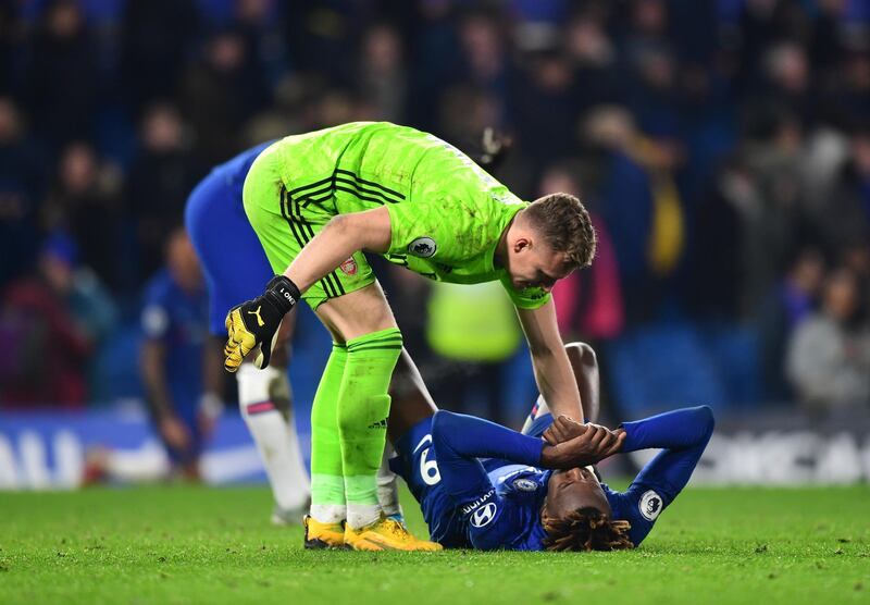 Bernd Leno of Arsenal checks on Tammy Abraham after his injury. Getty