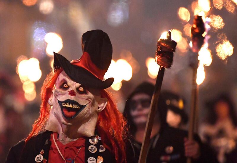 Participants parade through the town. Reuters