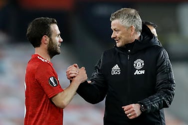 Manchester United manager Ole Gunnar Solskjaer with Juan Mata after the Europa League quarter-final win over Granada. Reuters