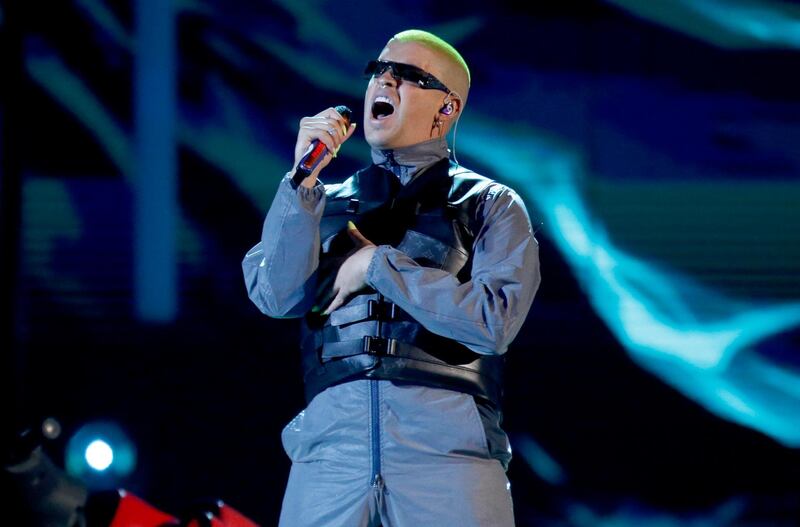 FILE - Bad Bunny performs a medley at the Billboard Latin Music Awards in Las Vegas on April 25, 2019. The Puerto Rican superstar is the music platformâ€™s most-streamed artist of the year with 8.3 billion streams globally. The Latin Grammy winner and hitmaker, who released a new album last week, leads a top five list that also includes Drake, J Balvin, Juice WRLD and the Weeknd. (Photo by Eric Jamison/Invision/AP, File)