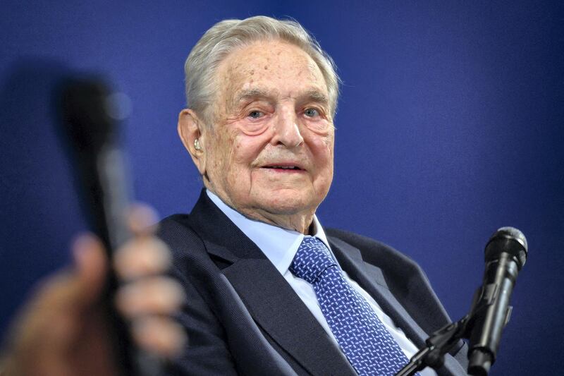 Hungarian-born US investor and philanthropist George Soros looks on after having delivered a speech on the sidelines of the World Economic Forum (WEF) annual meeting, on January 23, 2020 in Davos, eastern Switzerland. (Photo by FABRICE COFFRINI / AFP)