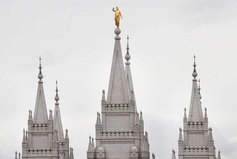 SALT LAKE CITY, UT - MARCH 18: The gold Moroni statue atop the historic Salt Lake City Mormon Temple is missing its horn after an earthquake on March 18, 2020 in Salt Lake City, Utah. A 5.7-magnitude earthquake hit the Salt Lake Valley on Wednesday morning followed by at least 20 aftershocks ranging from magnitude 2.5 to 3.9.   George Frey/Getty Images/AFP
== FOR NEWSPAPERS, INTERNET, TELCOS & TELEVISION USE ONLY ==
