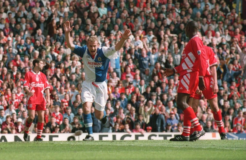 14 MAY 1994:  ALAN SHEARER OF BLACKBURN CELEBRATES SCORING AS THE LIVERPOOL DEFENCE LOOK ON  DURING THEIR FA PREMIERSHIP MATCH AT ANFIELD. Mandatory Credit: Shaun Botterill/ALLSPORT