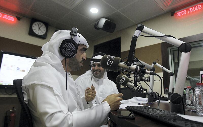 Dubai, May 20,2018: Presenters (L) Salem Mohammed and (R)  Khalifa Al Falasi at Al Oula Radio at the live show at their studio in Dubai. Satish Kumar for the National / Story by Anna Zacharias