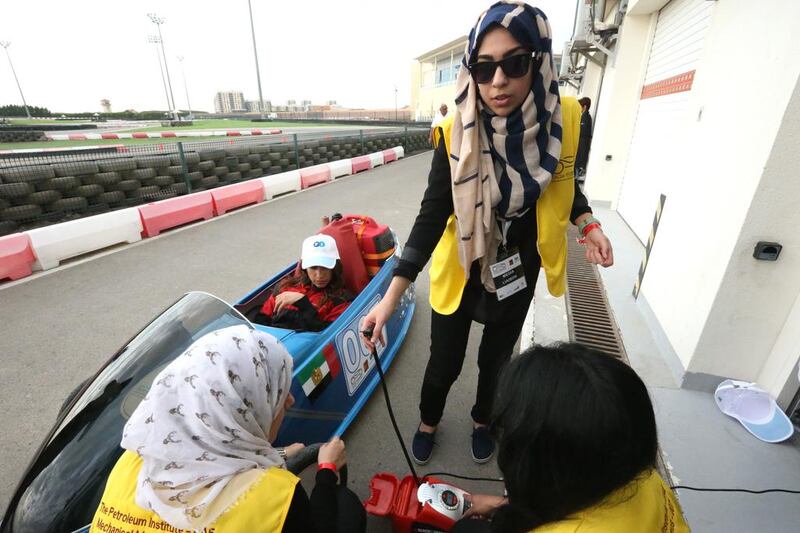 Hajar Rabie, 20, and her all-female team from the Petroleum Institute compete in today’s race at Al Forsan in a hybrid car. Fatima Al Marzooqi / The National